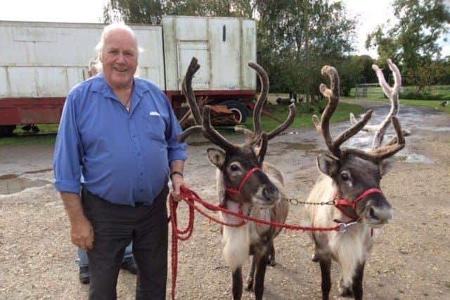 Martin Lacey with two of his reindeer. ANL-170703-091513001