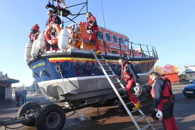 Crew get on board for the final trip of Skegness' old lifeboat the Lincolnshire Poacher. MSKP-060317-11 ANL-170703-143827001