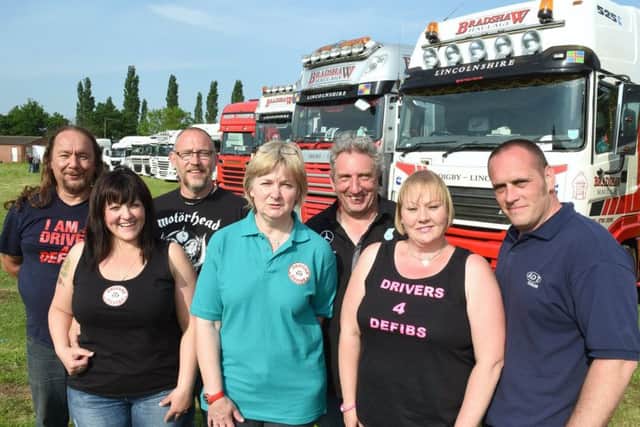 Drivers 4 Defibs fun day at Billinghay. Organisers L-R ennis Darmon, Rebecca Bradshaw, Fred Bradshaw, Sally Donner, Neil Donner, Louise Couling, Dan Couling. EMN-170313-132359001