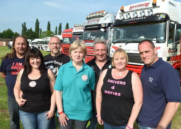Drivers 4 Defibs fun day at Billinghay. Organisers L-R ennis Darmon, Rebecca Bradshaw, Fred Bradshaw, Sally Donner, Neil Donner, Louise Couling, Dan Couling. EMN-170313-132359001