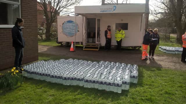 Anglian Water handing out bottled water in Tetford