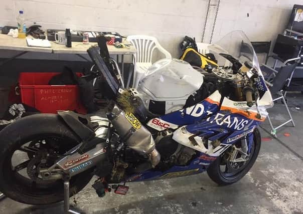 Crowe's BMW shows the scars after his Brands Hatch crash EMN-170903-093533002