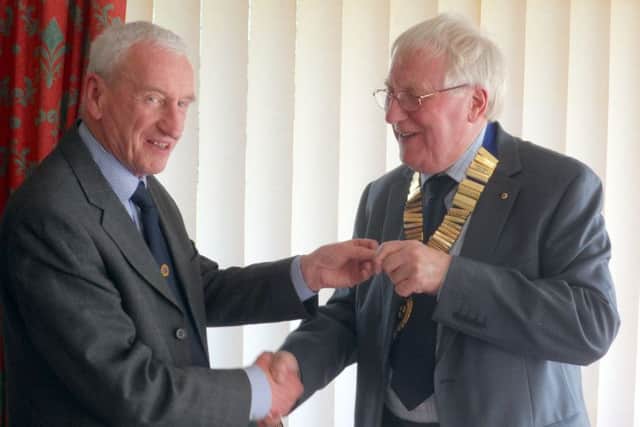 At the 34th annual general meeting of Market Rasen Probus Club, outgoing president John Frewen-Lord, pictured left, handed over the chain of office to Bryan Storey. EMN-170314-112231001