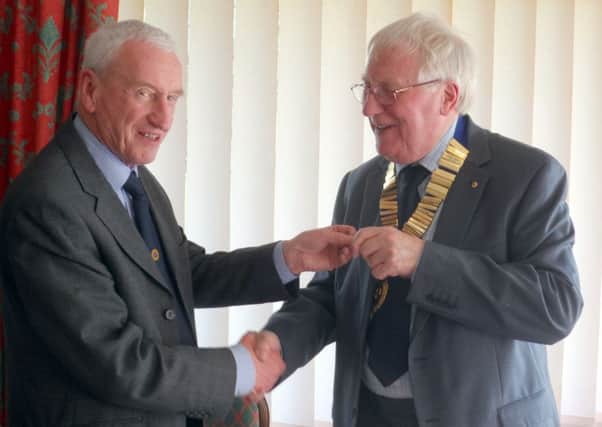 At the 34th annual general meeting of Market Rasen Probus Club, outgoing president John Frewen-Lord, pictured left, handed over the chain of office to Bryan Storey. EMN-170314-112231001