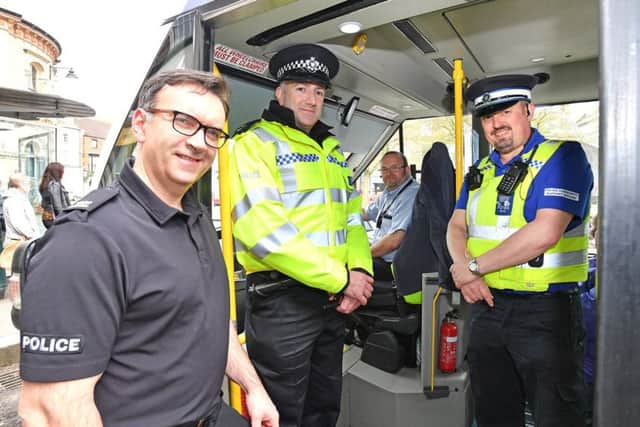 PC Mark Johnson, Inspector Phil Baker and PCSO Nigel Wass at the launch of the new CallCollect 'Busbeat' route between Louth and Horncastle.
