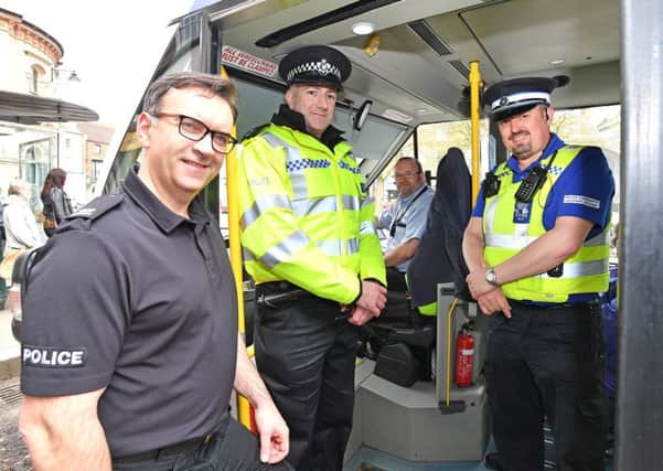 PC Mark Johnson, Inspector Phil Baker and PCSO Nigel Wass at the launch of the new CallCollect 'Busbeat' route between Louth and Horncastle.