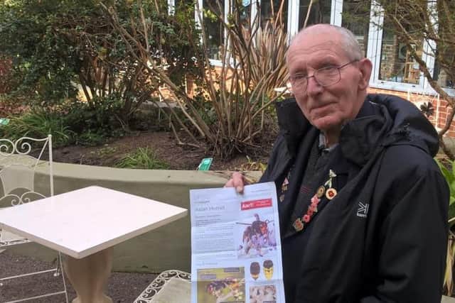 Bee-d all about it: Fred Parker with a poster warning about the threat of the Asian hornet to bees in the Lincolnshire Wolds