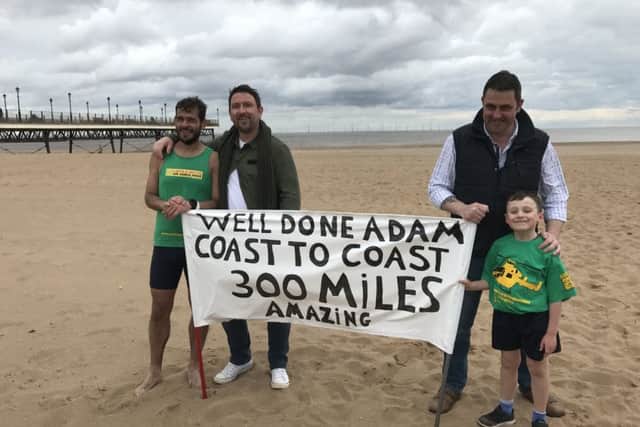 At the end, from left, Adam, Jamie, fellow ex-servicemen Matt Harrison, and Adams nephew Leo.