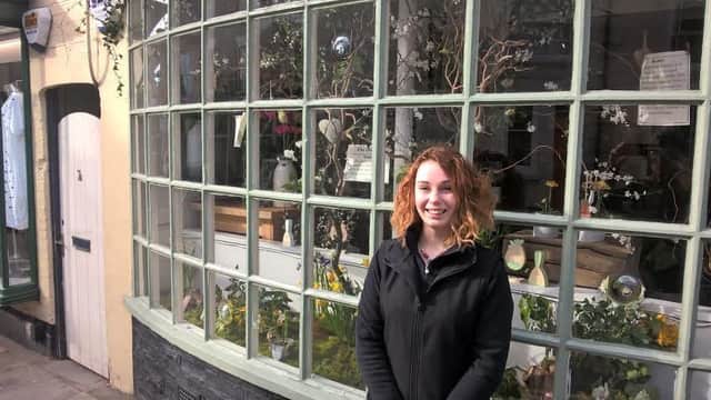 Top designer:  Alana Howe in front of the display which features at the florists in North Street.