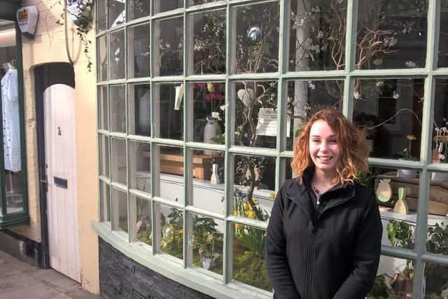 Top designer: Alana Howe in front of the display which features at the florists in North Street.