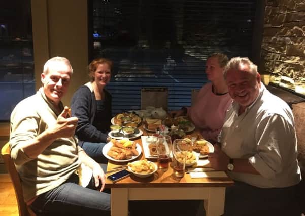 YV chef Phil Vickery, fellow chef Paul Vidic and their wives tucking into fish and chips at the Elite fish restaurant in Sleaford on Tuesday night. EMN-171003-102754001