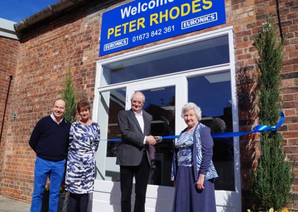 Jim Broadbent cutting the ribbon watched by owners Roger and Abigail Clark, and Joyce RhodesEMN-170324-125602001