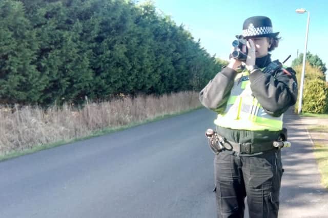PCSO Sally West checking speeds in Everington's Lane, Skegness. ANL-171003-144452001