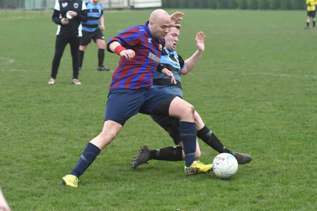 Leverton Reserves' Ashley Bond and Neil Wheskey or Northgate Olympic. Photo: David Dawson.