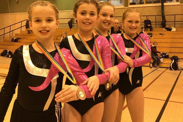 Trampoline Level 1 9-10 years women's team bronze medallists Rachel Shields, Lexie Blankley, Natalie Tarapata and Lucy Lloyd. EMN-170314-091036002