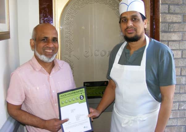 India Garden owner Nadim Aziz and chef Ghulam Sarowar. EMN-170316-154953001