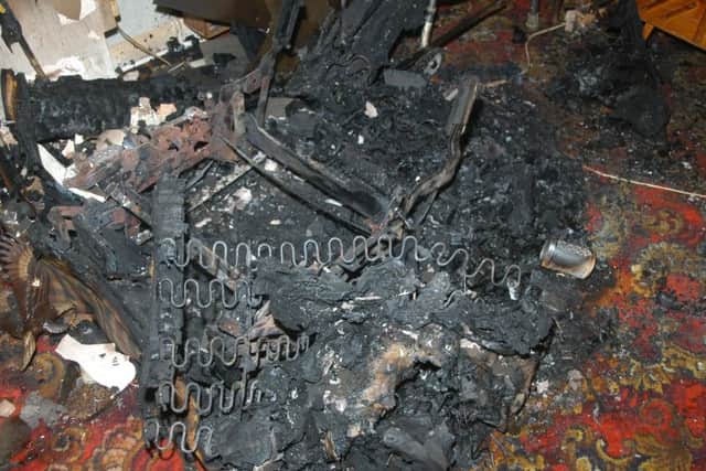 What was left of June Buffham's chair following the blaze caused by an illegal cigarette. Photo supplied