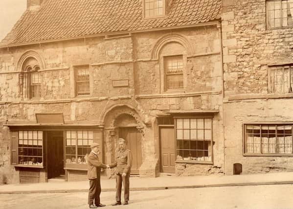 Photo of Jews Court in Lincoln taken by John Wield in the early 1900s and one of many fascinating  photos on show in the opening exhibition at the Woodhall Spa Cottage Museum EMN-170320-073509001