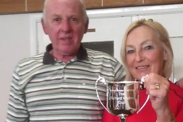 Steve Armstrong and Pam Holbrook with the RJW Trophy EMN-170320-100031002