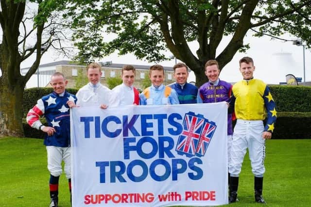 Jockeys get on board to welcome troops. Photo: John Hoy EMN-170321-152408001