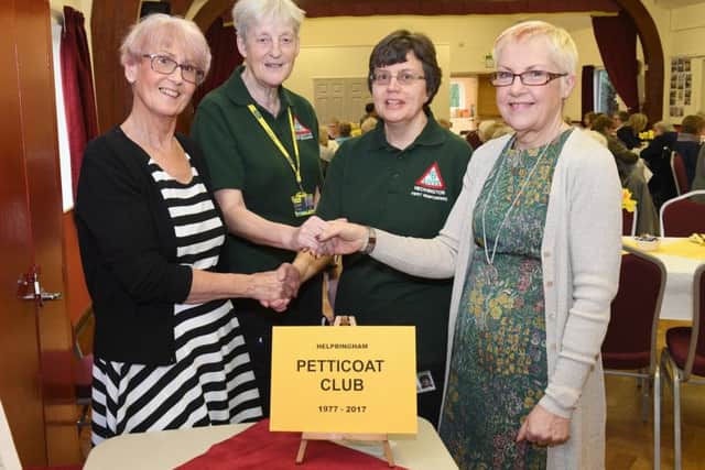 Helpringham Petticoat Club's 40th anniversary tea party with representatives from LIVES Heckington. EMN-170324-121023001