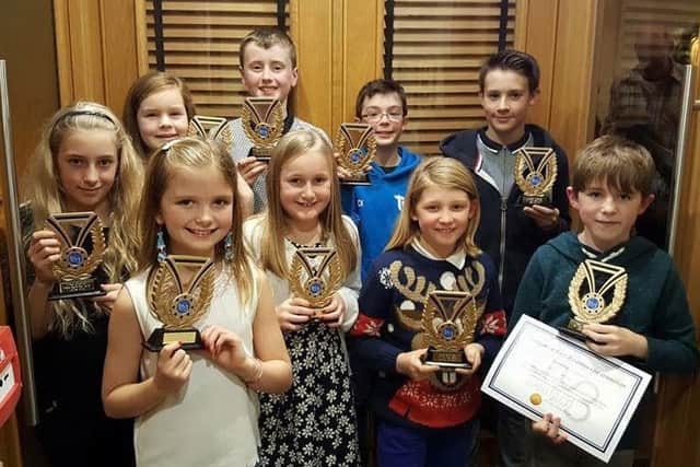 Junior members at the Sleaford Tr3 triathlon club at their awards night. EMN-170327-111920001