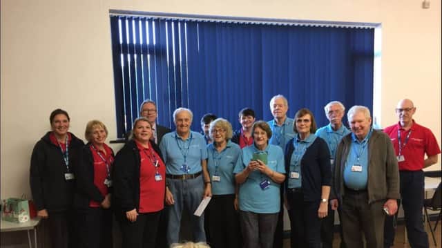 Stan Lowis (fifth from left) is pictured with his friends and colleagues from the Cardiac Rehabilitation Service.