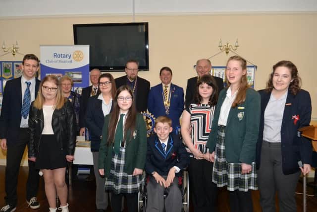 The Rotary Clubs Sleaford Children of Courage. (front) from left - Ethan Kelly-Hall, Amba Smith, Lauren Smith, Keira Beeson, Thomas Talbot, Kerry Brothwell, Victoria Lyon and Kate Parr. (Back) - Daphne Beever - President of Sleaford Kesteven Inner Wheel, Walter Drayton - President of the Rotary Club of Sleaford Kesteven, Coun David Suiter - Mayor, Alan Thomas - President of the Rotary Club of Sleaford and Coun John Money - chairman of NKDC. EMN-170324-155605001