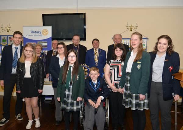 The Rotary Clubs Sleaford Children of Courage. (front) from left - Ethan Kelly-Hall, Amba Smith, Lauren Smith, Keira Beeson, Thomas Talbot, Kerry Brothwell, Victoria Lyon and Kate Parr. (Back) - Daphne Beever - President of Sleaford Kesteven Inner Wheel, Walter Drayton - President of the Rotary Club of Sleaford Kesteven, Coun David Suiter - Mayor, Alan Thomas - President of the Rotary Club of Sleaford and Coun John Money - chairman of NKDC. EMN-170324-155605001
