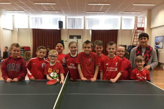 The table tennis club at the Richmond School, Skegness, raising money with Mrs Jean Taylor,  Tom Jarvis' first coach. ANL-170324-122504001