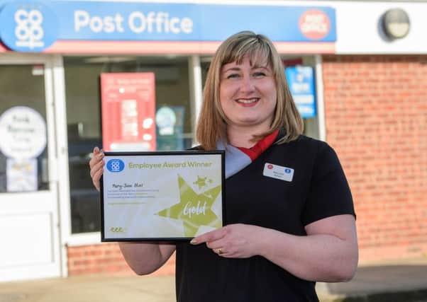 Golden girl: Market Rasen Post Office manager Mary-Jane Storr.