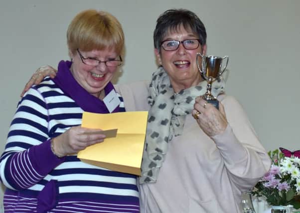 Spa Afternoon WI: compeitions winner Jan Cowan, right, with retiring president Hazel White EMN-170304-072217001