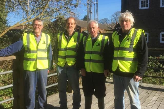 Louth Navigation Trust volunteers in their new LNTvests from local firm AJ Embroidery. EMN-170304-092445001