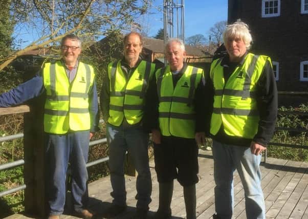Louth Navigation Trust volunteers in their new LNTvests from local firm AJ Embroidery. EMN-170304-092445001