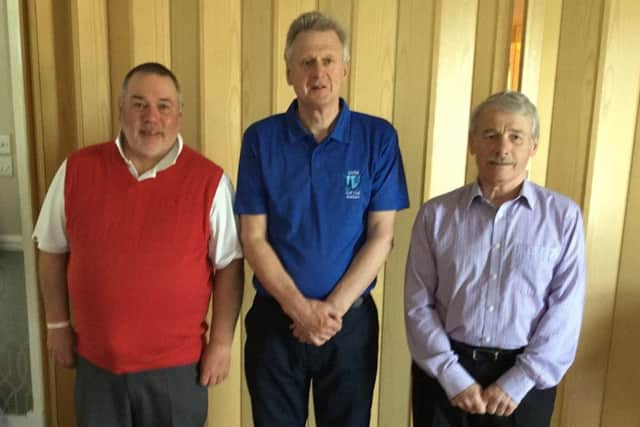 Red team captain Terry Winter with victorious skipper Bryan Utteridge and vice-captain John Wallis EMN-170327-105033002