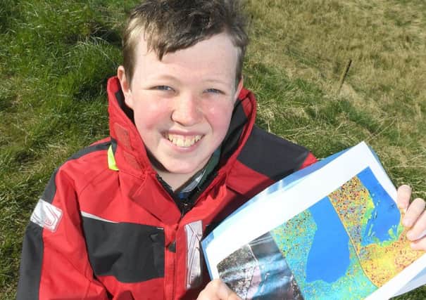 James pearson 13 who has won Â£10k from Space Agency, after designing a app about coastal erosion. Pictured at Freiston Shore.