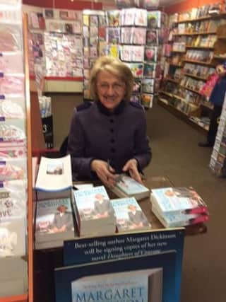 Margaret Dickinson signing copies of her new book in Perkins