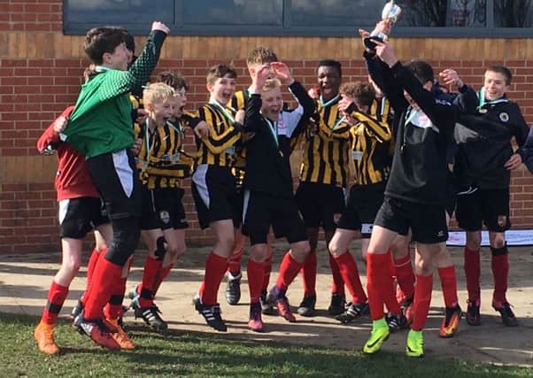 Carres Under 14s celebrate their single-goal victory against Caistor Grammar School EMN-170330-104136002