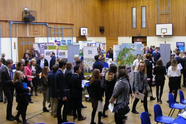 Sleaford students fill the sports hall at St George's Academy for the recruitment event. EMN-170331-170640001
