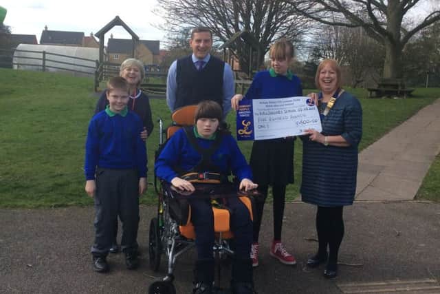 A cheque presented by Sleaford and District Lioness Club for ?400 to the Willoughby School. EMN-170304-170914001