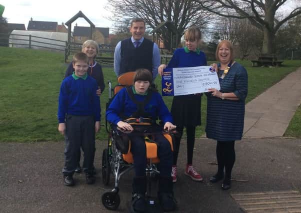 A cheque presented by Sleaford and District Lioness Club for ?400 to the Willoughby School. EMN-170304-170914001