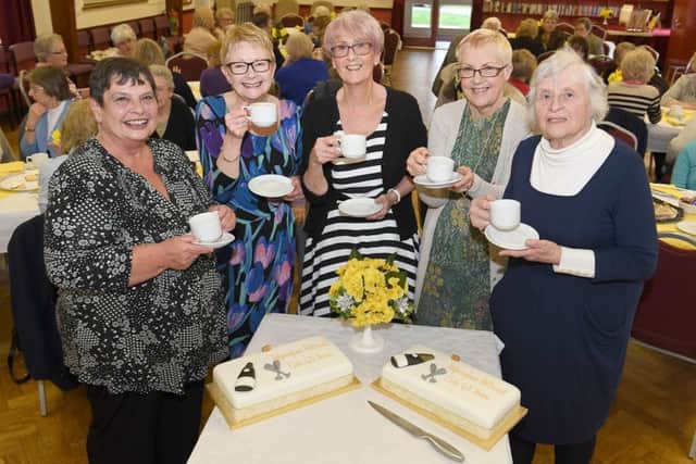 Helpringham Petticoat Club's 40th anniversary and cheque presentation to LIVES. Committee members, from left - Laraine Wright, Joyce Drake, Gill Grace, Marian Stocking and Rosemary Bailey with anniversary cake. EMN-170329-165334001