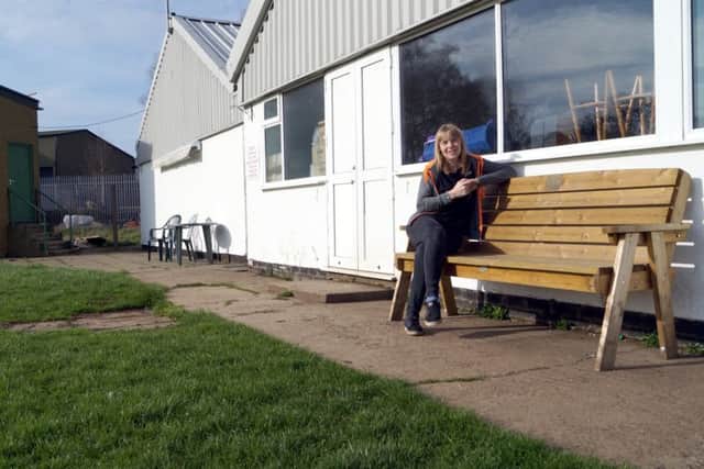 Kerri Paul in the area which will be resurfaced with money raised from the Tesco Bags of Help grant scheme EMN-171004-102023001