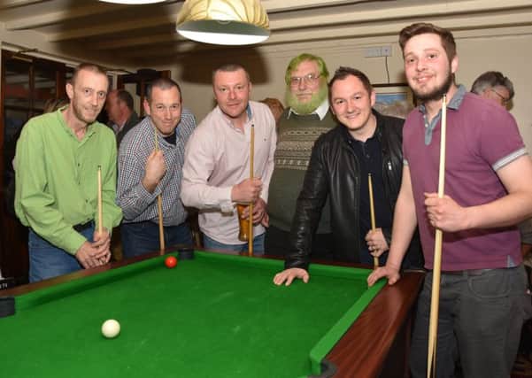 Pool team players from the Crossroads Inn at East Barkwith who will be doing a 24 hour sponsored challenge on April 15 to raise money for  We are Macmillan Cancer Support. From left: Paul Brader. David Ward, Leon Andrews. Adge Winstanley, who dyed his hair green raised ?400, Tom Bollan and Sean Radley. EMN-170604-073714001