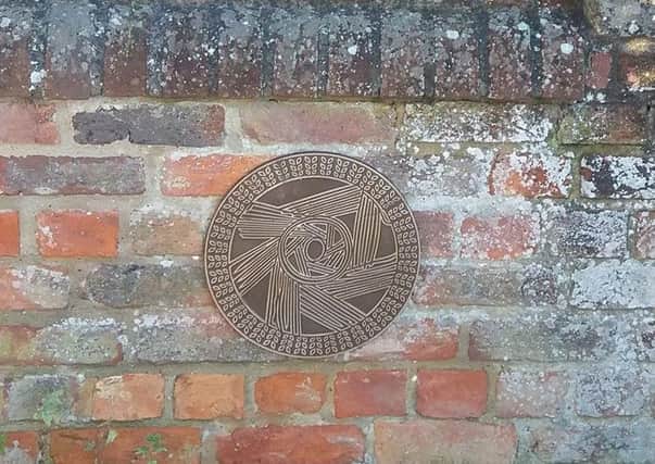 The When in Sleaford arts and heritage trail plaque at Cogglesford Mill. EMN-170331-184628001