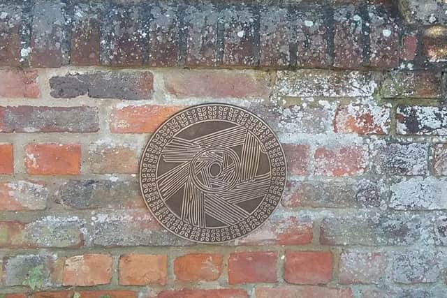 The When in Sleaford arts and heritage trail plaque at Cogglesford Mill. EMN-170331-184628001