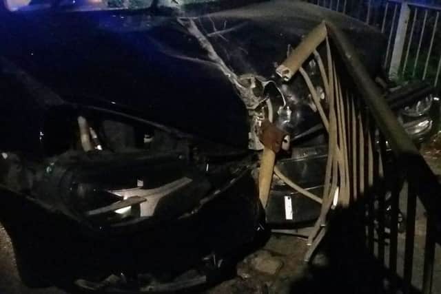 The car, embedded end on in railings on Galley Hill bridge, Sleaford. Photo: PC Jimmy Conway via Twitter. EMN-170304-101318001