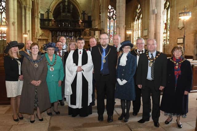 Mayor's civic service at St Deny's Church, Sleaford. Mayor of Sleaford David Suiter pictured with civic guests and The Reverend Philip Johnson. EMN-170304-203556001
