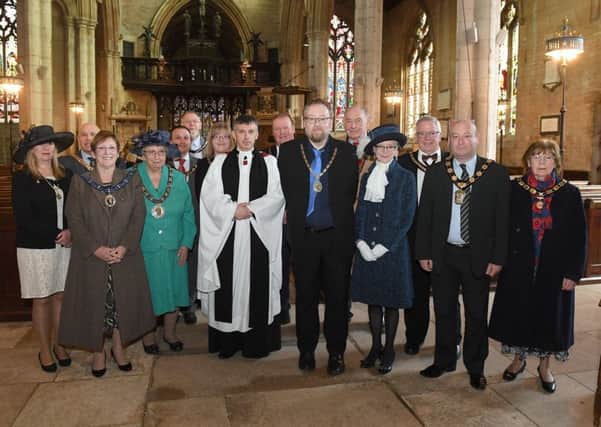 Mayor's civic service at St Deny's Church, Sleaford. Mayor of Sleaford David Suiter pictured with civic guests and The Reverend Philip Johnson. EMN-170304-203556001