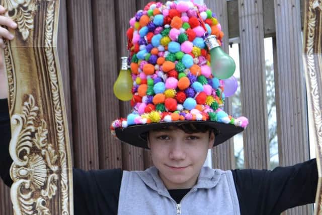 This academy student had that lightbulb moment designing his hat. EMN-170604-161841001
